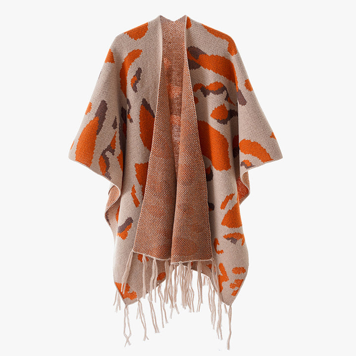Damen Oversize-Strickponcho mit animalischem Jacquard und Fransensaum Echo Archiv