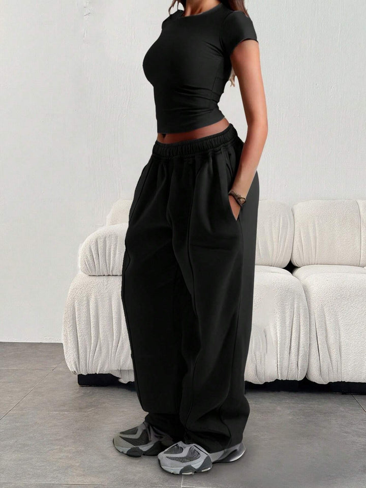 Damen nan enges Cropshirt und weite High-Waist Jogginghosen-Set Echo Archiv