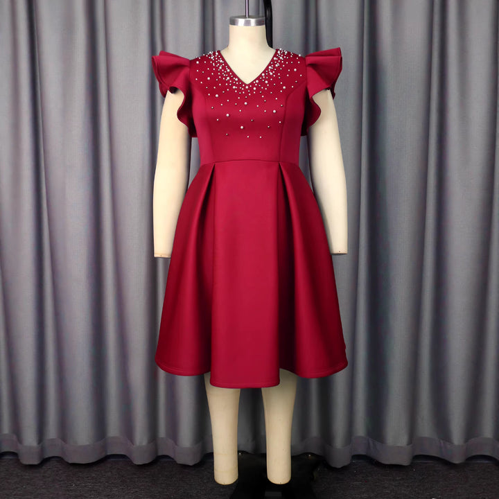 Damen Elegantes Kleid mit funkelndem Strass-Besatz und voluminösen Ärmeln Echo Archiv