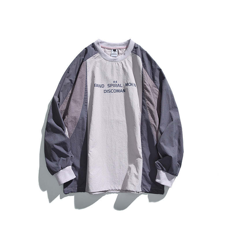 Unisex Weitgeschnittenes Colorblock-Langarmshirt aus leichter Nylon-Mischung mit Raglanärmeln und Brustprint Echo Archiv