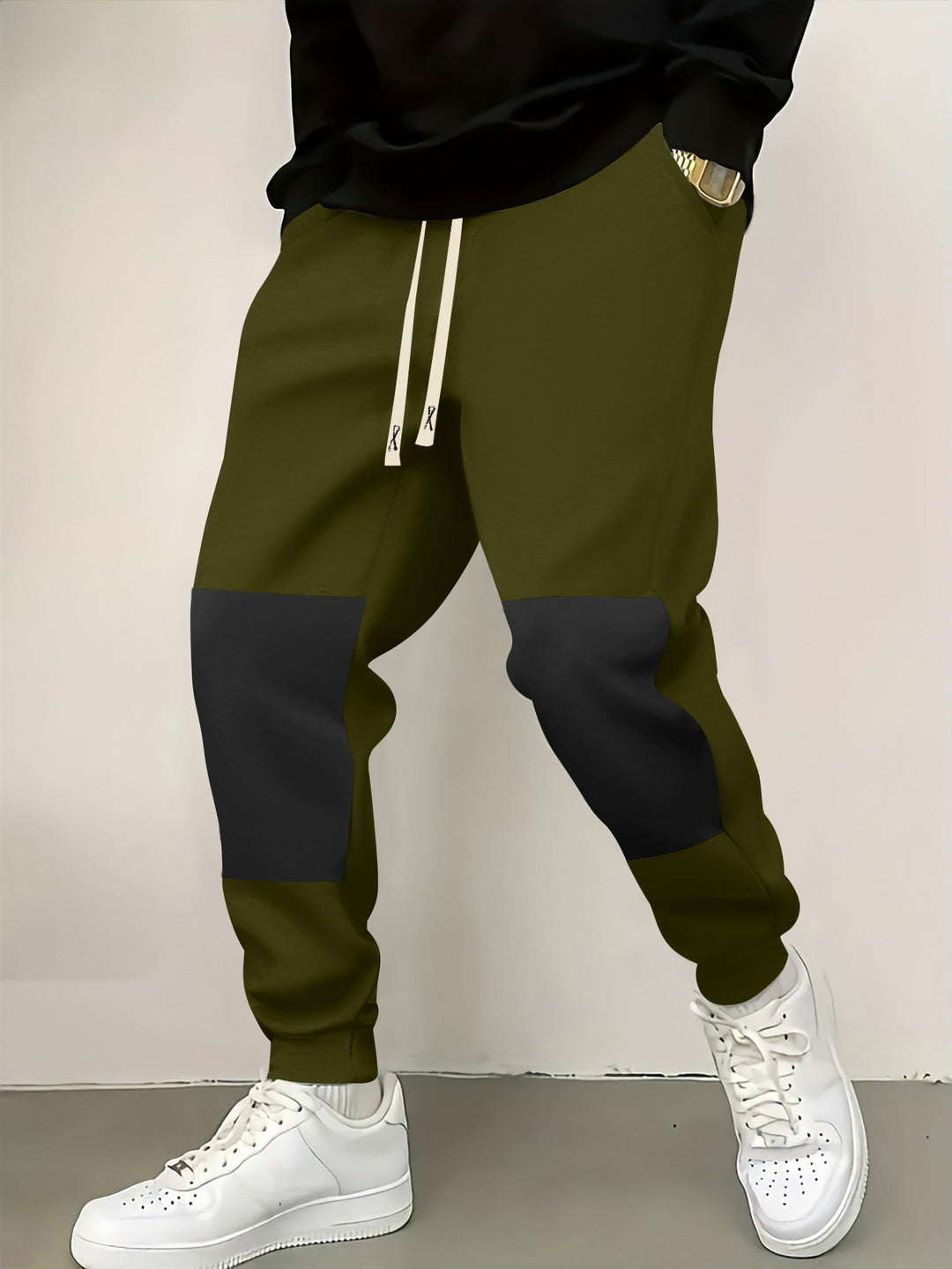 Herren elegante Sporthose mit modernen Farbblockelementen Echoarchiv