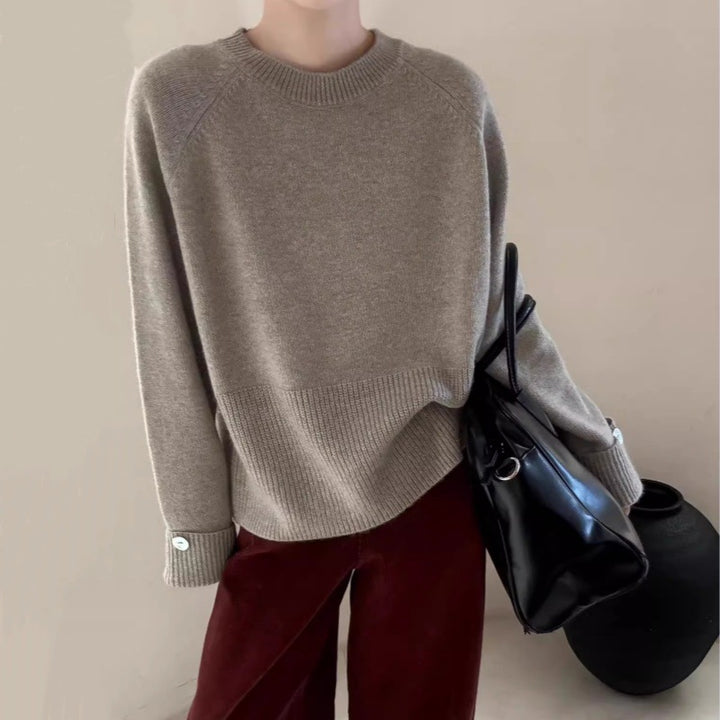 Damen Oversize-Rundhalspullover mit verlängerten Manschetten und Zierknopf Echoarchiv
