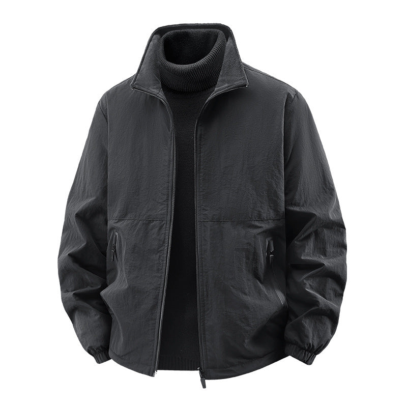 Men's minimalist stand-collar travel jacket with sealed zip pockets and elastic cuffs – Taviero