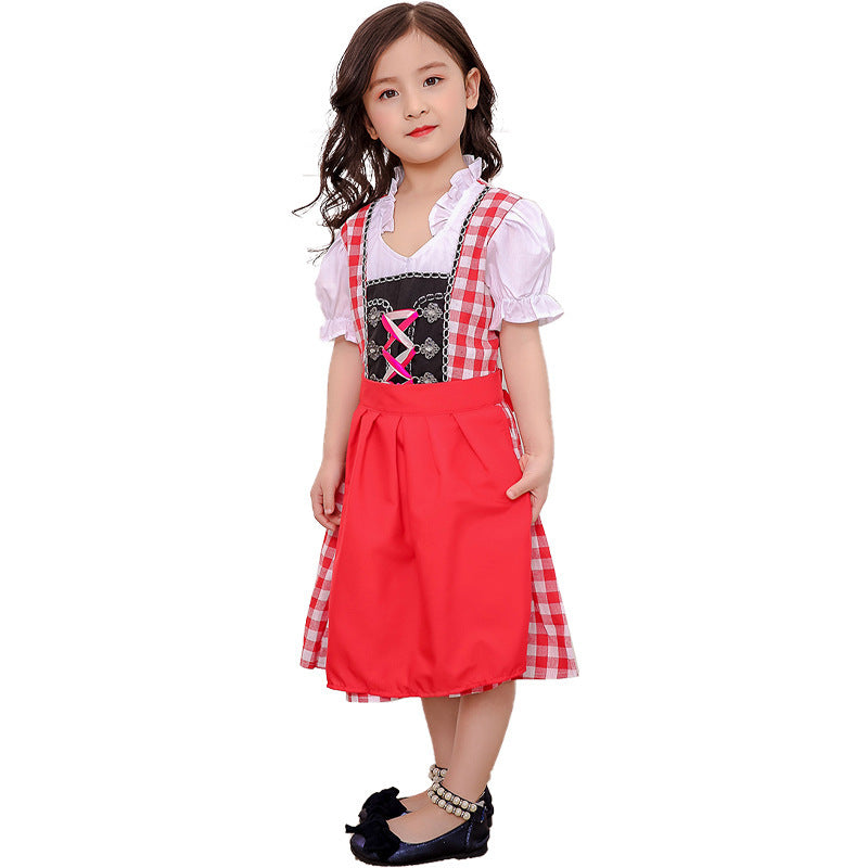 Damen nan traditionelles Kinderdirndlkleid mit geschnürtem Mieder, bestickten Details und abnehmbarer Schürze Echo Archiv