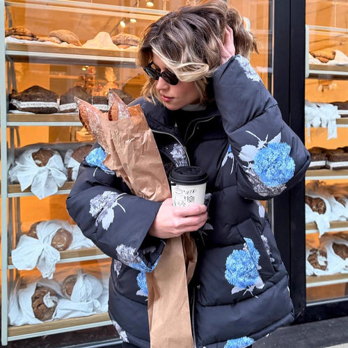 Damen Gepolsterte Oversize-Steppjacke mit Blumenprint und Kapuze Echoarchiv