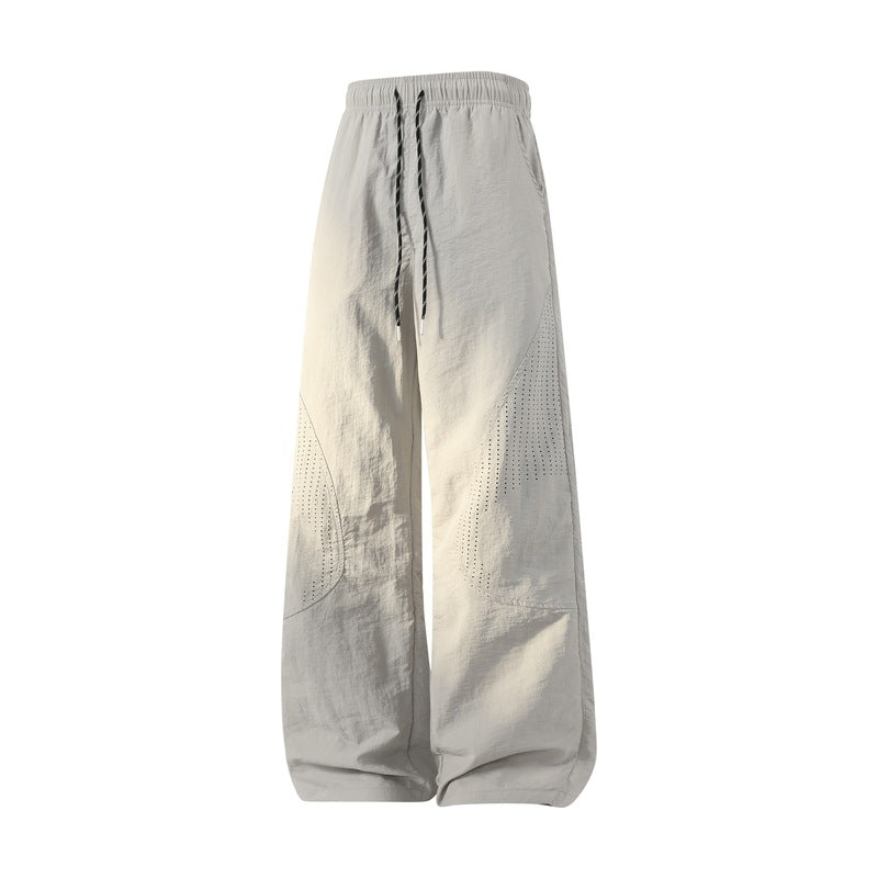 Damen Weite Baggy-Leinenoptik-Hose mit Tunnelzug, perforierten Einsätzen & Relaxed-Silhouette Echoarchiv
