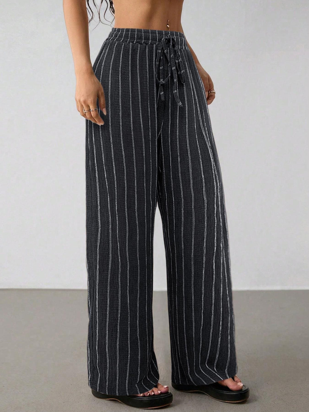 Damen Weite Strickhose mit hohem Bund und Kordelzug Echo Archiv