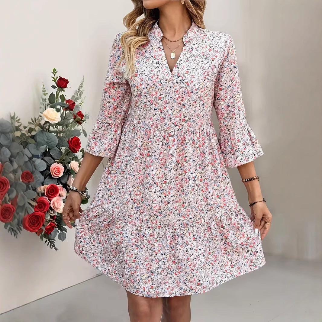 Damen Florales Babydoll-Kleid mit V-Ausschnitt, hohem Empire‑Bund und Glockenärmeln Echo Archiv