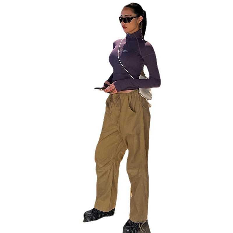 Damen nan figurbetontes Langarm-Zip-Top mit tiefem V-Ausschnitt und elastischem Funktionsstretch Echo Archiv
