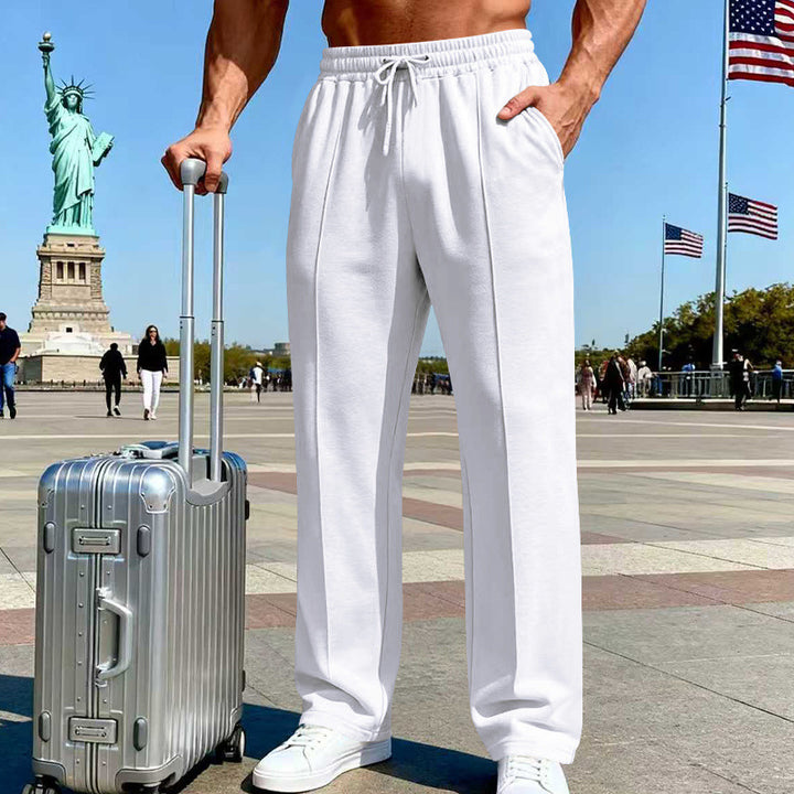 Herren Weite Travel-Loungehose mit Bügelfalte, elastischem Tunnelzug und seitlichen Eingrifftaschen – Sorevano