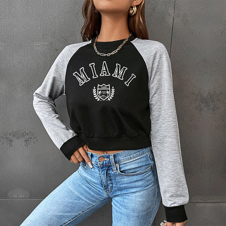 Damen Kurzgeschnittenes College-Cropped-Sweatshirt mit Raglanärmeln und elastischem Saum Echoarchiv