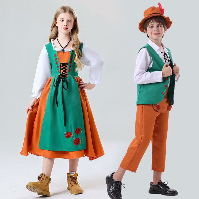 Damen nan folkloristisches Kinderdirndl mit geschnürtem Mieder und bestickter Schürze Echo Archiv