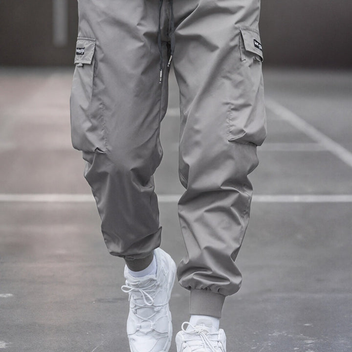 Herren Tapered Cargo-Joggerhose mit elastischem Tunnelzug, verstärkten Klappentaschen & gerippten Knöchelbündchen Echo Archiv