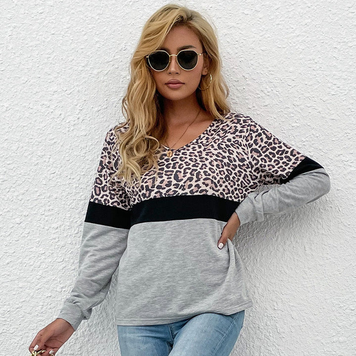 Damen Langarmshirt mit V-Ausschnitt und Leopardenmuster im Colorblock-Design Echoarchiv