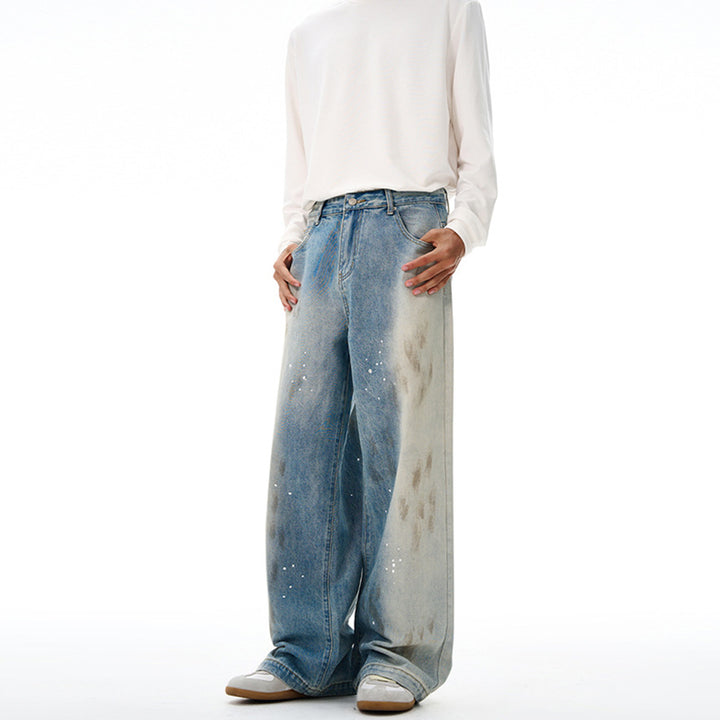 Herren Oversize-Baggy-Denim-Jeans mit künstlerischem Farb-Splatter und weitem Saum Echo Archiv