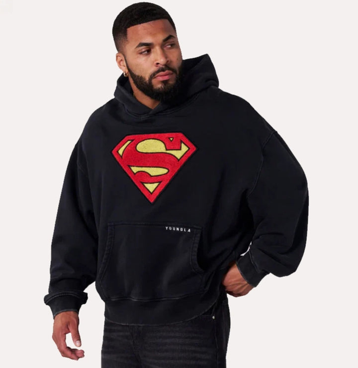 Herren nan weit geschnittener Kapuzenpullover mit markantem Comic‑S‑Logo Kängurutasche und gewaschener Look Echo Archiv