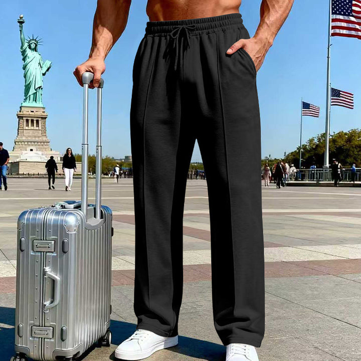 Herren Weite Travel-Loungehose mit Bügelfalte, elastischem Tunnelzug und seitlichen Eingrifftaschen – Sorevano