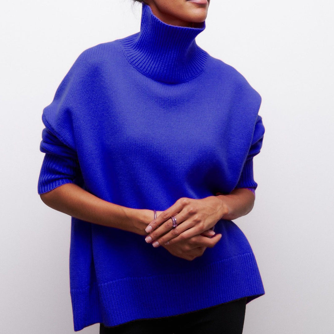 Damen Kuscheliger Oversize Rollkragenpullover mit verdeckten Seitenschlitzen und extra langem Rippbund – Mavelle