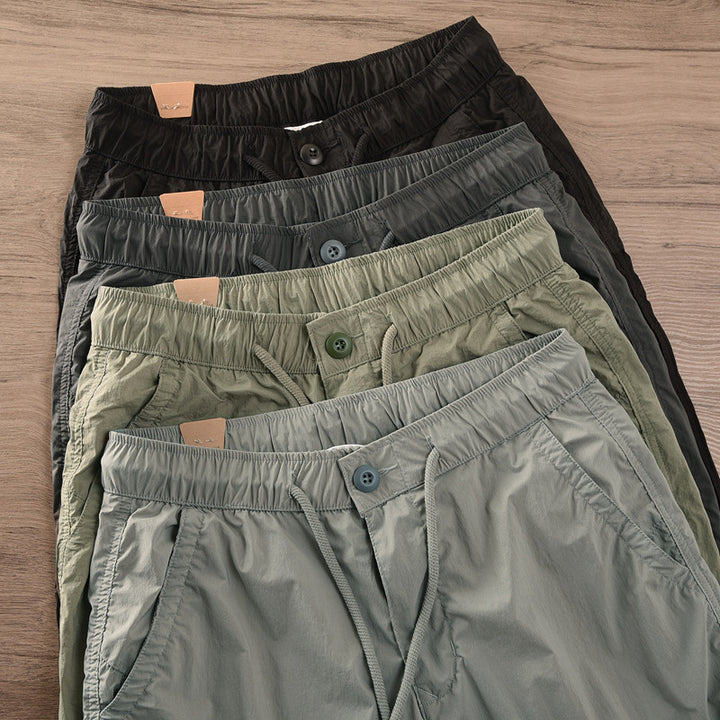 Herren lässige Jogginghose mit elastischem Bund und seitlichen Taschen Echoarchiv