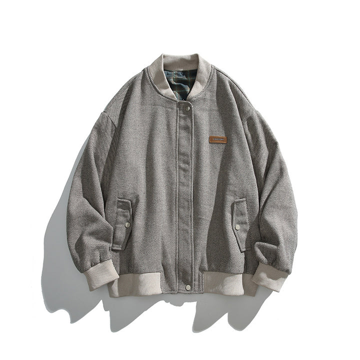 Unisex Boxy-Bomberjacke im Fischgrät-Look mit Rippbündchen, Pattentaschen und verdeckter Druckknopfblende Echo Archiv