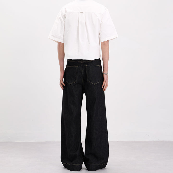 Herren Oversize-Denim-Palazzohose mit skulpturalen Paneelnähten und tiefem Schritt Echo Archiv
