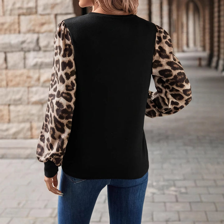 Damen Sweatshirt mit Chiffon-Ballonärmeln und Leo-Print Echoarchiv
