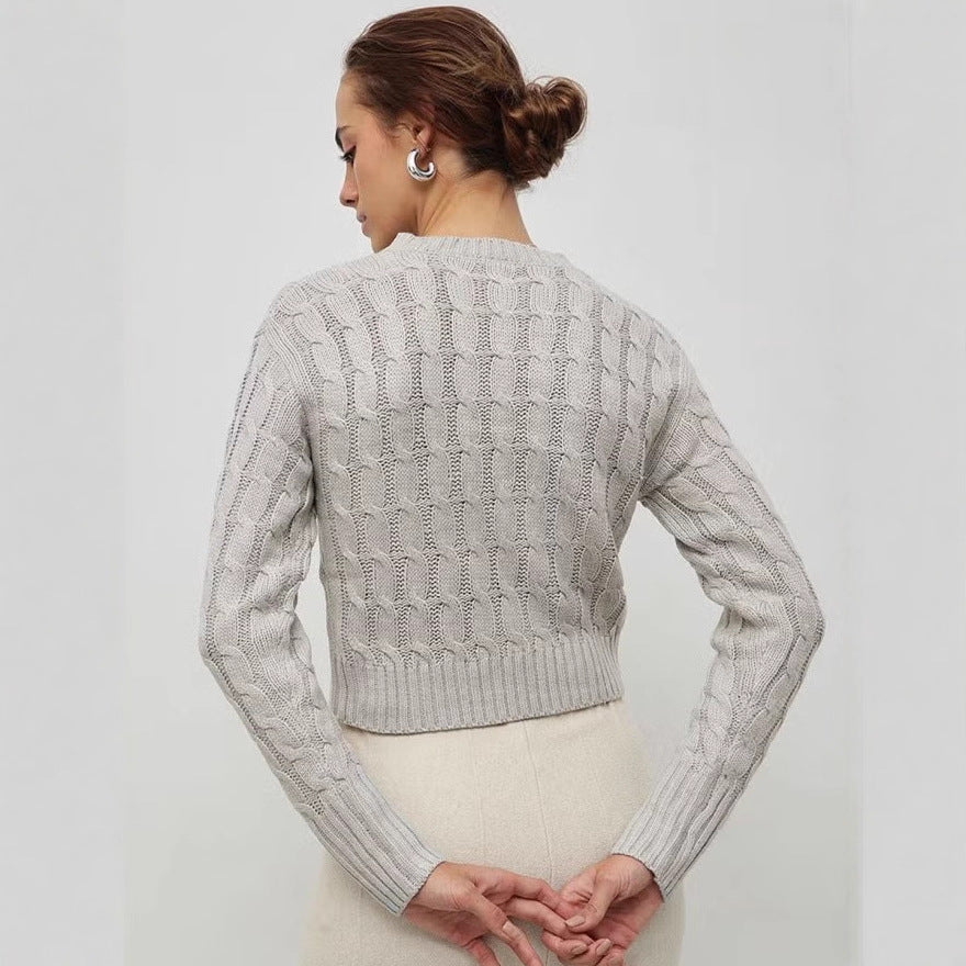 Damen Kurzgeschnittener Zopfstrick-Pullover mit Rundhalsausschnitt und Rippbündchen – Mavelle