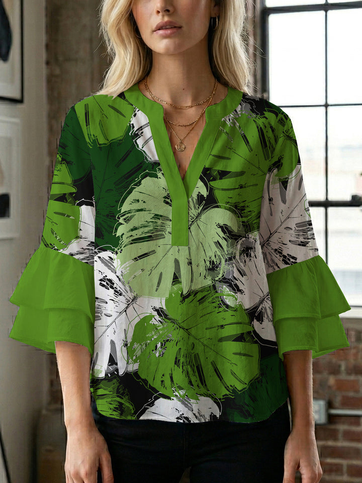 Damen Bluse mit voluminösen Flügelärmel und intensivem Blattmuster Echo Archiv