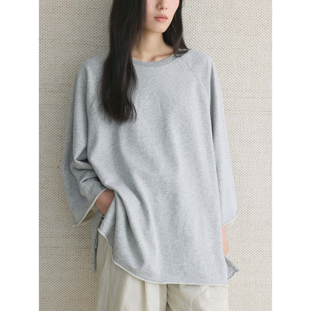 Damen Oversized Sweatshirt mit rohem Halsausschnitt und weiten Raglanärmeln Echoarchiv