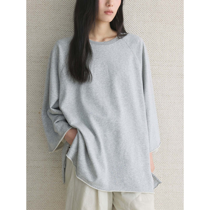 Damen Oversized Sweatshirt mit rohem Halsausschnitt und weiten Raglanärmeln Echoarchiv
