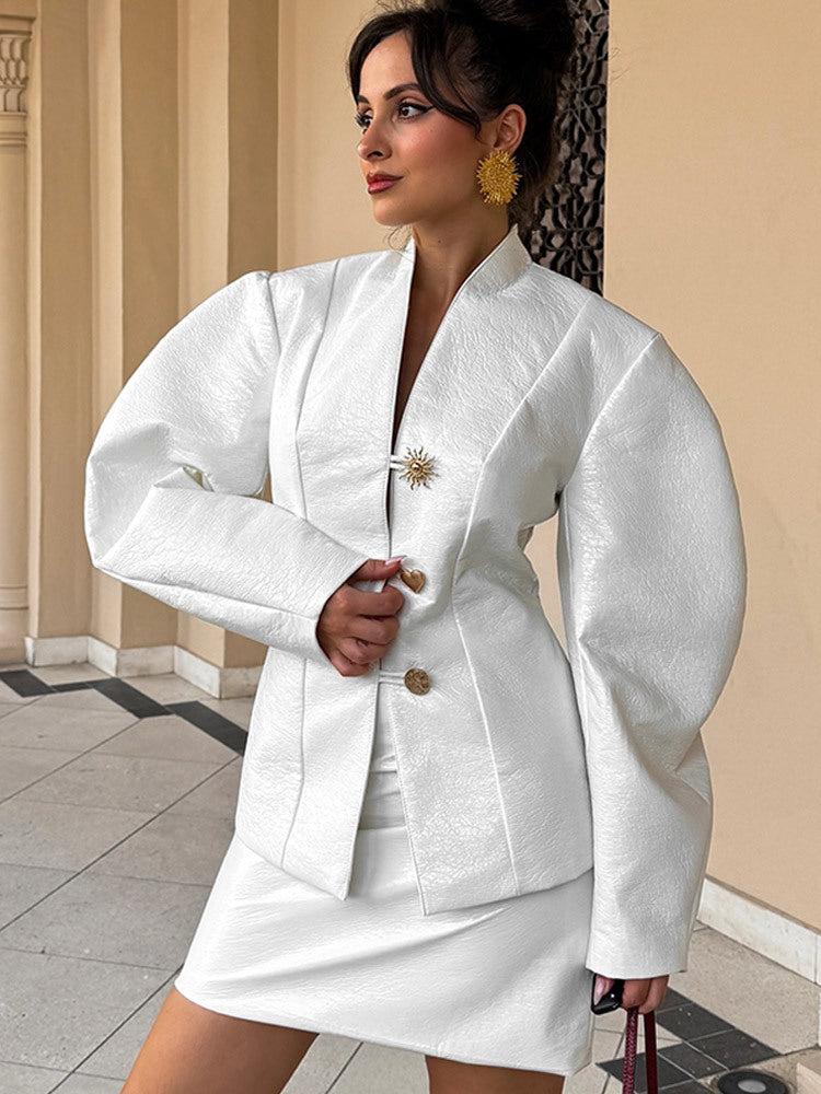 Damen Tailliertes Blazer‑Kostüm mit skulpturalen Ballonärmeln und Minirock Echoarchiv