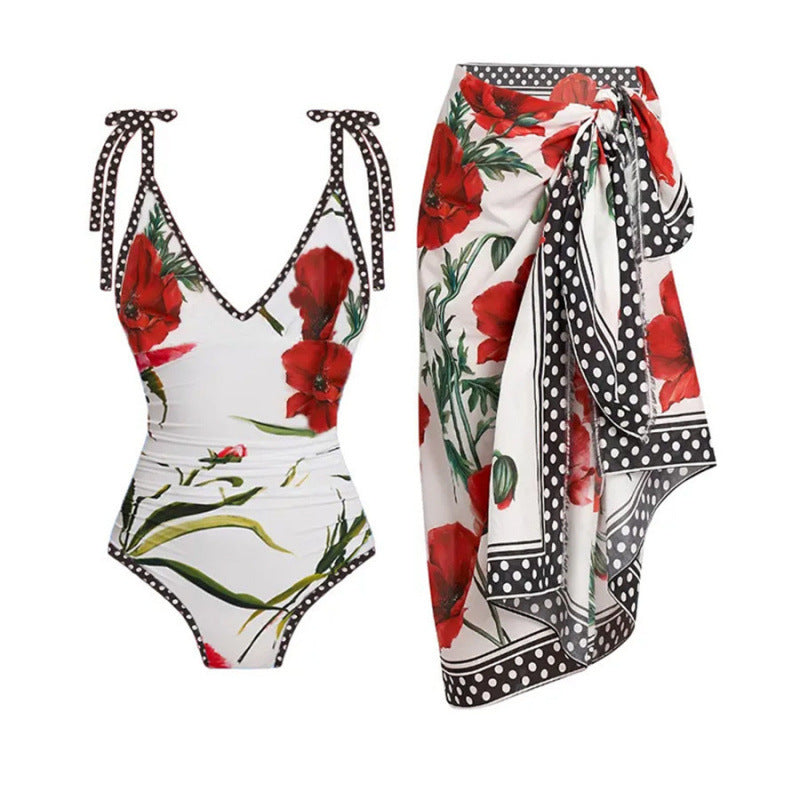 Damen Einteiler Badeanzug mit floralen Akzenten und passendem Wickelrock Echo Archiv