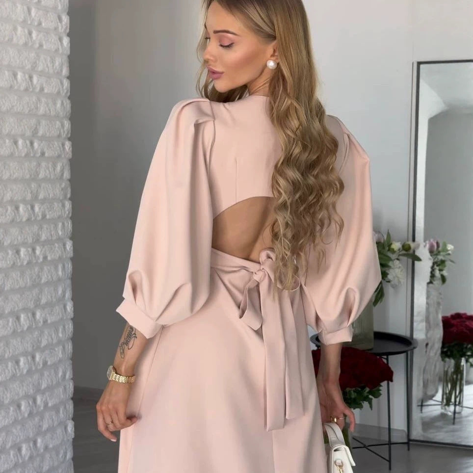 Damen Midikleid mit offenem Rückenausschnitt, voluminösen Puffärmeln und Bindegürtel Echoarchiv