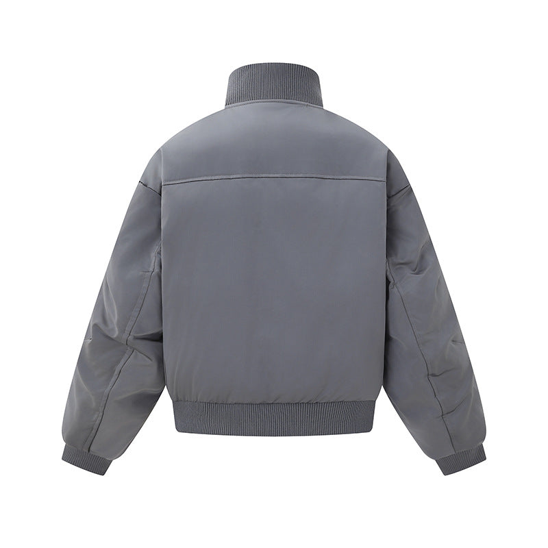 Damen Kurz geschnittene wattierte Blousonjacke im Boxy‑Schnitt mit hohem Rippenkragen und markanten Eingrifftaschen Echoarchiv