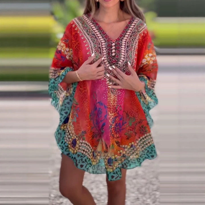 Damen nan kurzes Tunika-Kaftan mit verziertem V-Ausschnitt und floral-animalischer Bordüre Echo Archiv