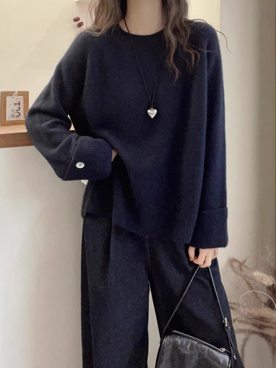 Damen Oversize‑Feinstrickpullover mit breitem Rippbund, extraweiten Ärmelabschlüssen und Zierknopf Echoarchiv