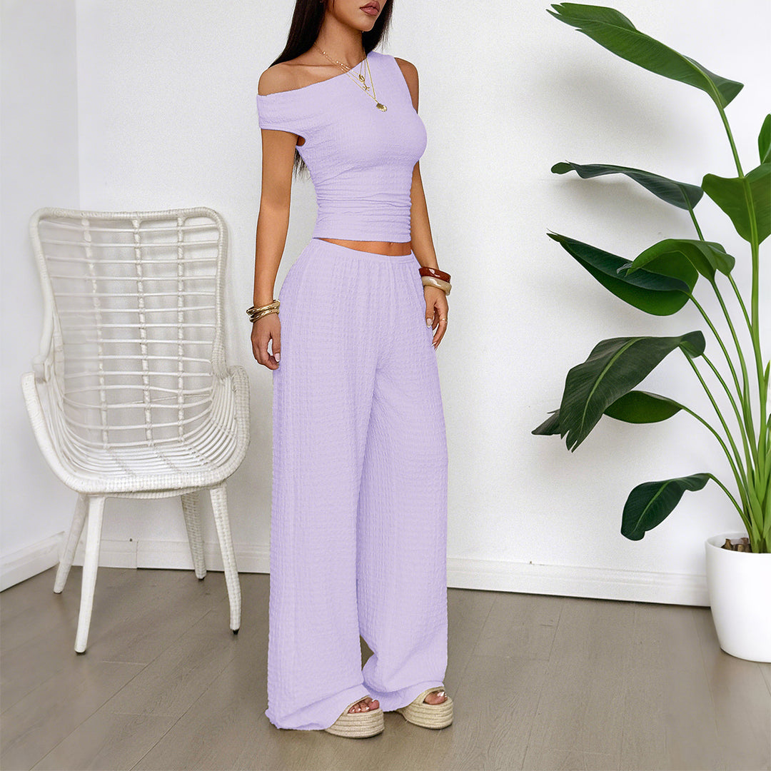 Damen Zweiteiliges Set aus elastischem Rippstoff mit asymmetrischem Top und weitem Hosen Echo Archiv