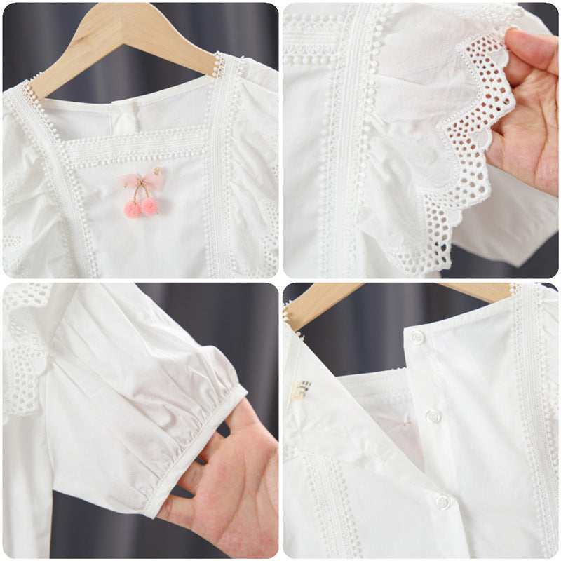 Mädchen Bluse mit verspieltem Rüschendesign und kunstvoller Häkelverzierung Echo Archiv
