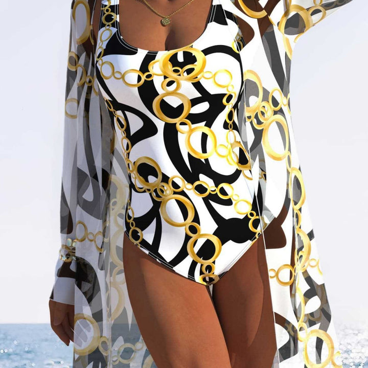 Damen eleganter Einteiler Badeanzug mit transparentem Überwurf und modernem Ringdesign Echo Archiv