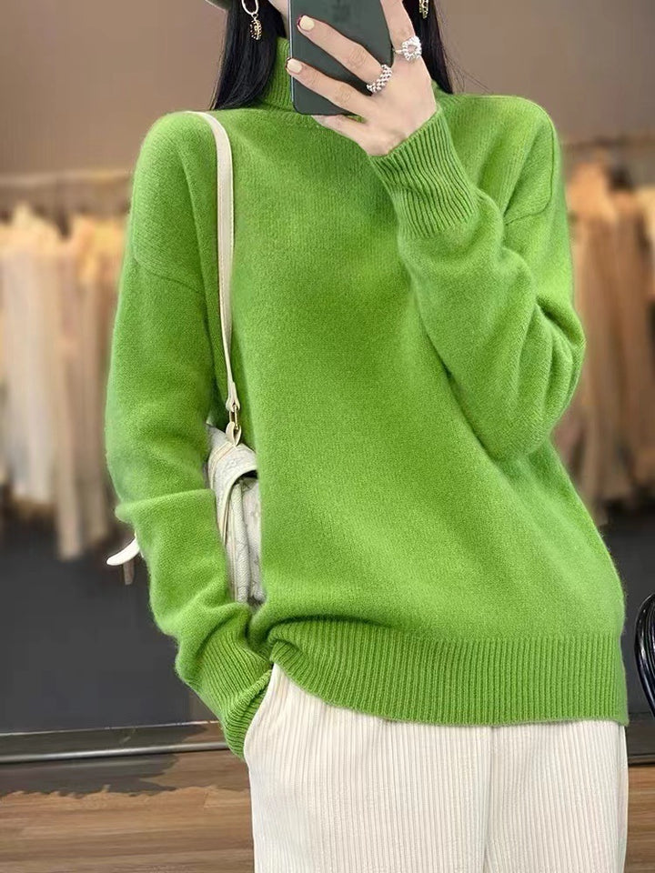 Damen Oversize Feinstrickpullover mit hohem Rollkragen und Seitenschlitzen – Mavelle