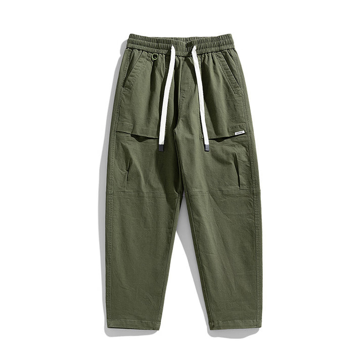 Herren Baggy-Utility-Cargohose im Tapered-Schnitt mit elastischem Tunnelzugbund, aufgesetzten Fronttaschen und Knieabnähern Echo Archiv
