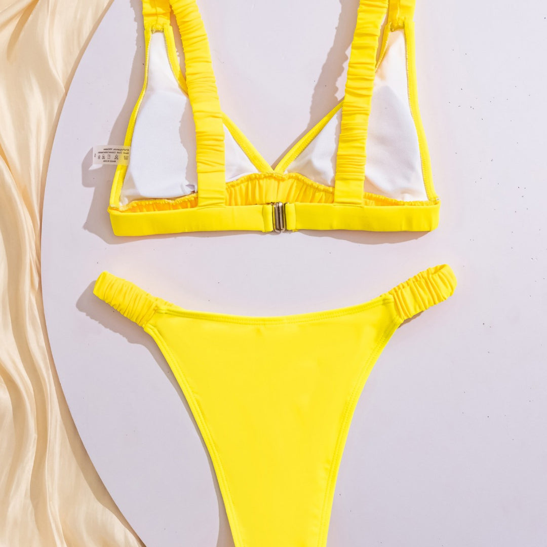 Damen Sportlicher Bikini mit gerafftem Oberteil und hohen Beinausschnitten Echo Archiv