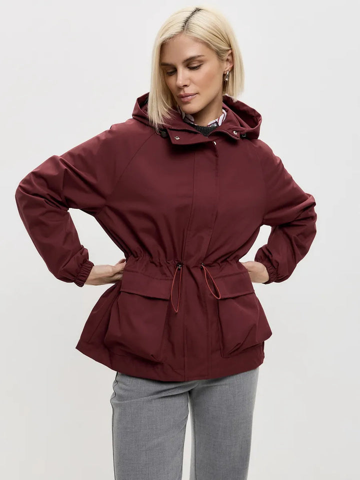 Damen wasserdichte Parka-Jacke mit Kapuze, Tunnelzugtaillierung und XXL-Klappentaschen – Célinea