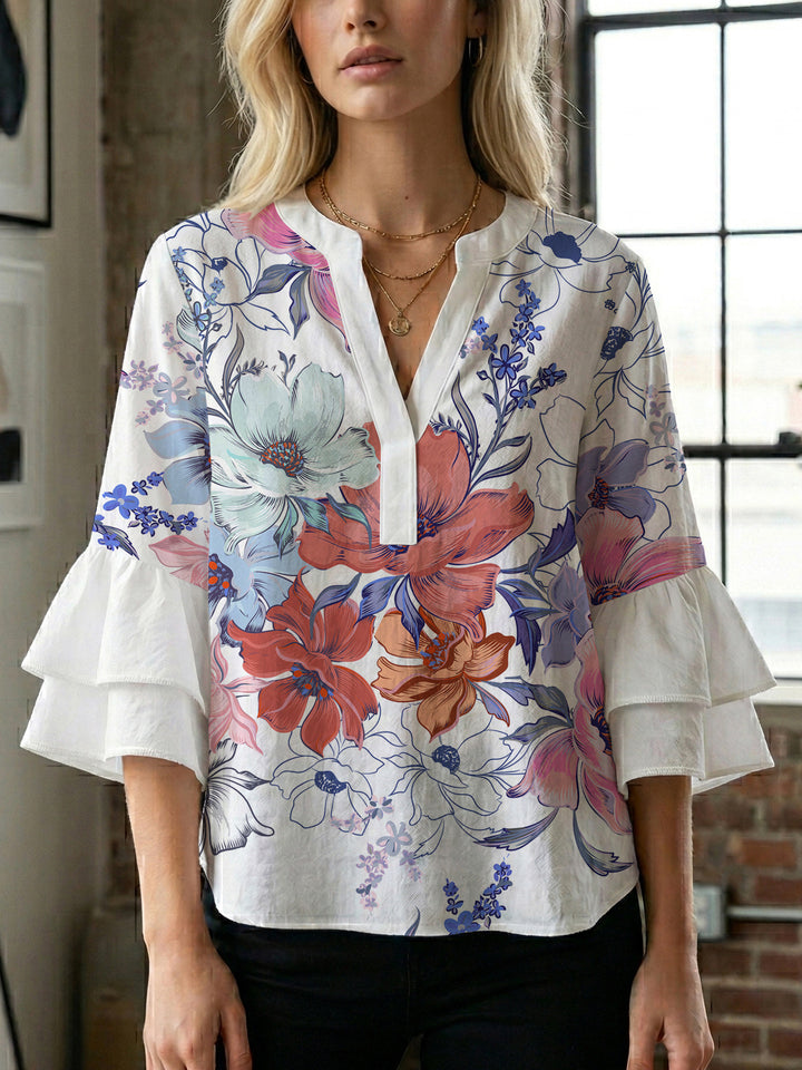 Damen Elegantes Oberteil mit voluminösen Rüchenärmeln und floralem Druck Echo Archiv