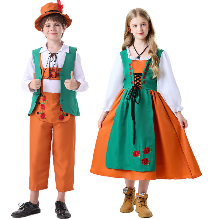 Damen nan folkloristisches Kinderdirndl mit geschnürtem Mieder und bestickter Schürze Echo Archiv