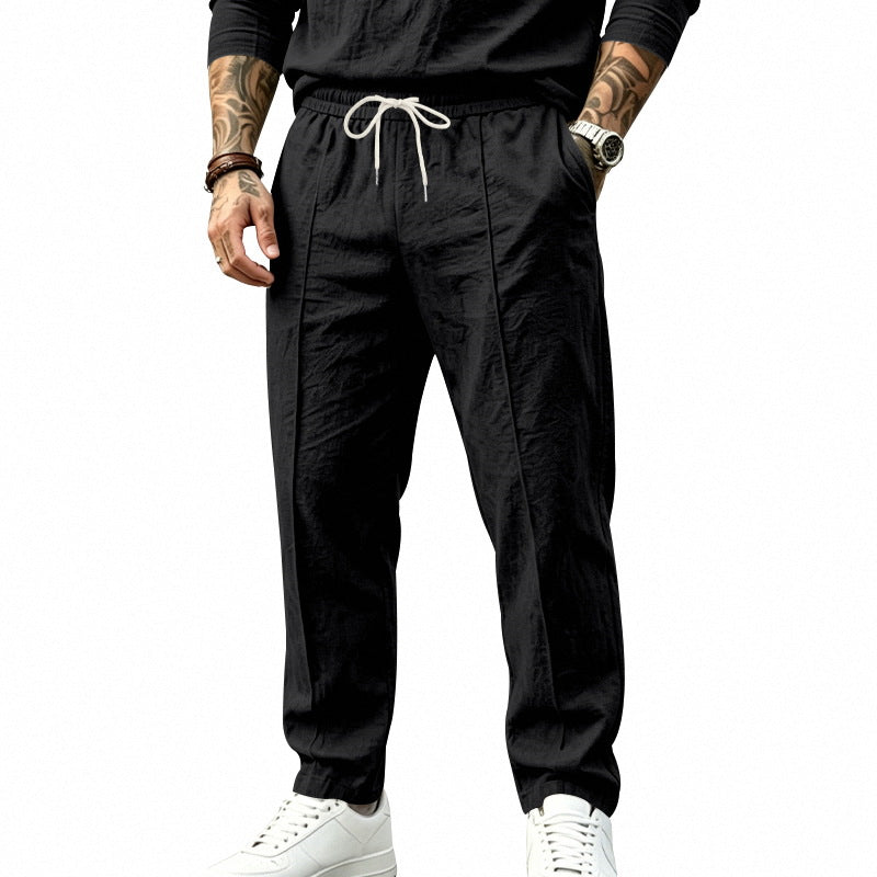 Herren Leichte Tapered-Jogginghose mit Bundfalten, elastischem Tunnelzug und Seitentaschen Echoarchiv