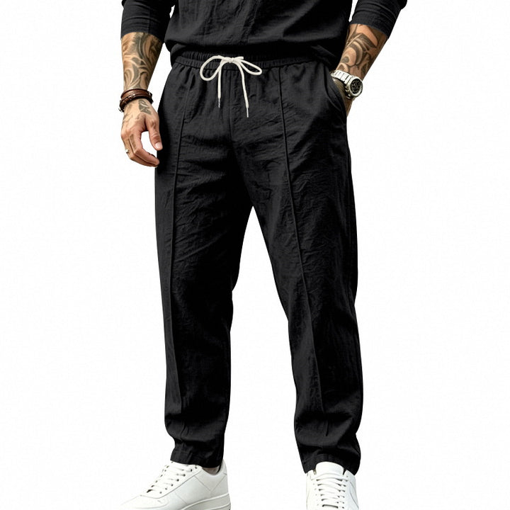 Herren Leichte Tapered-Jogginghose mit Bundfalten, elastischem Tunnelzug und Seitentaschen Echoarchiv