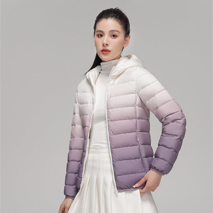 Damen ultraleichte Kapuzen-Steppjacke mit kompaktem Packmaß und windabweisender Hülle Echoarchiv