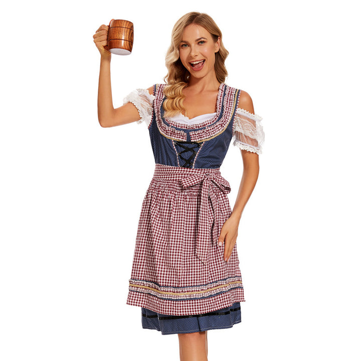 Damen nan traditionelles Dirndlkleid mit kariertem Schürzenrock, Schnürung und Spitzenärmeln Echo Archiv