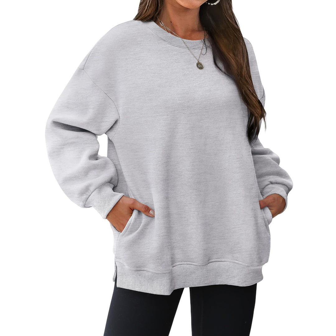 Damen verlängertes Oversize Rundhalspullover mit seitlichen Eingrifftaschen, Rippbündchen und überschnittener Schulter – Mavelle